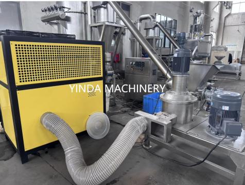YDWF grinding system connected to a yellow air cooling chiller